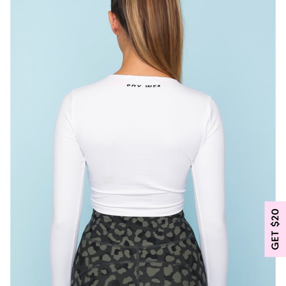 Sarah Day’s x WFA white cropped long sleeve shirt